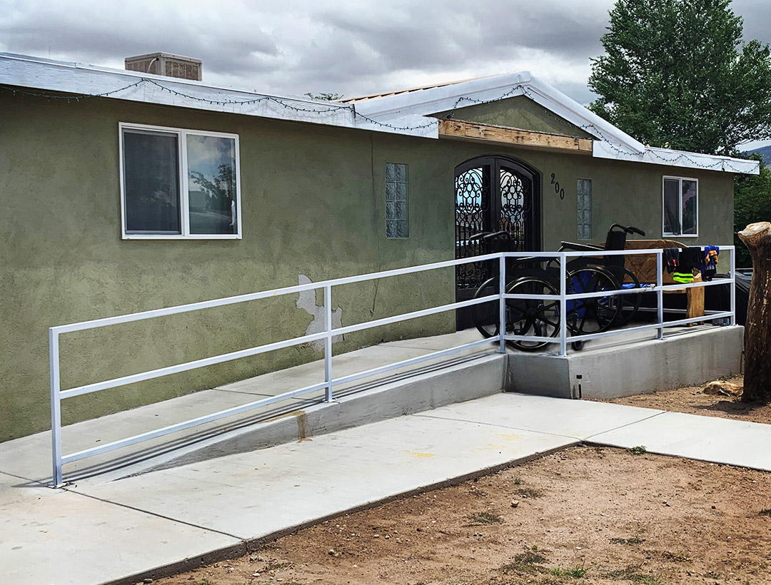 Maria's home in Sandoval County, with girls' wheelchairs on ramp